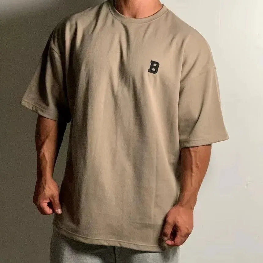 Herres Oversized Fitness T-Shirt – Afslappet Crew-Neck Træningstop med Faldende Skuldre