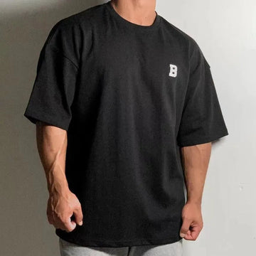 Herres Oversized Fitness T-Shirt – Afslappet Crew-Neck Træningstop med Faldende Skuldre