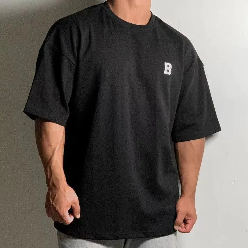 Herres Oversized Fitness T-Shirt – Afslappet Crew-Neck Træningstop med Faldende Skuldre