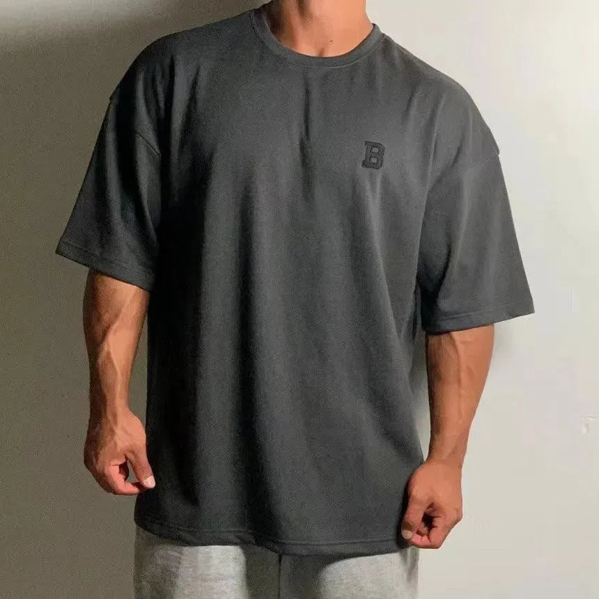 Herres Oversized Fitness T-Shirt – Afslappet Crew-Neck Træningstop med Faldende Skuldre