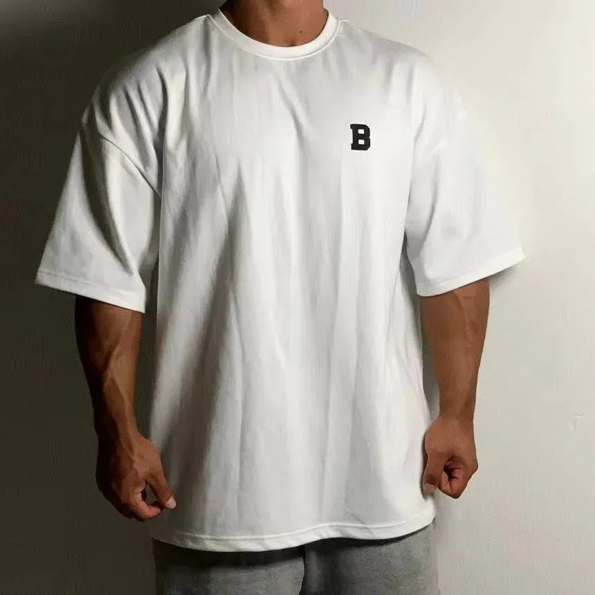 Herres Oversized Fitness T-Shirt – Afslappet Crew-Neck Træningstop med Faldende Skuldre